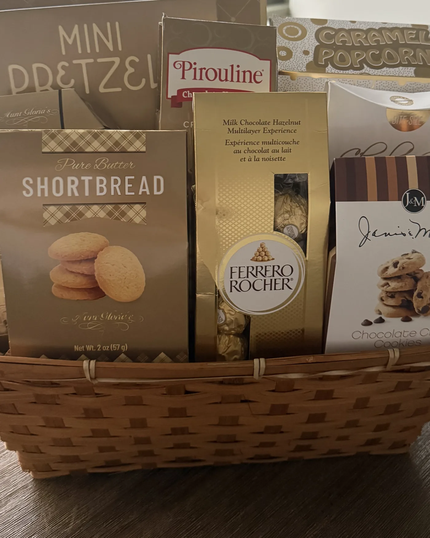 Gourmet snack basket with pretzels, chocolate and cookies